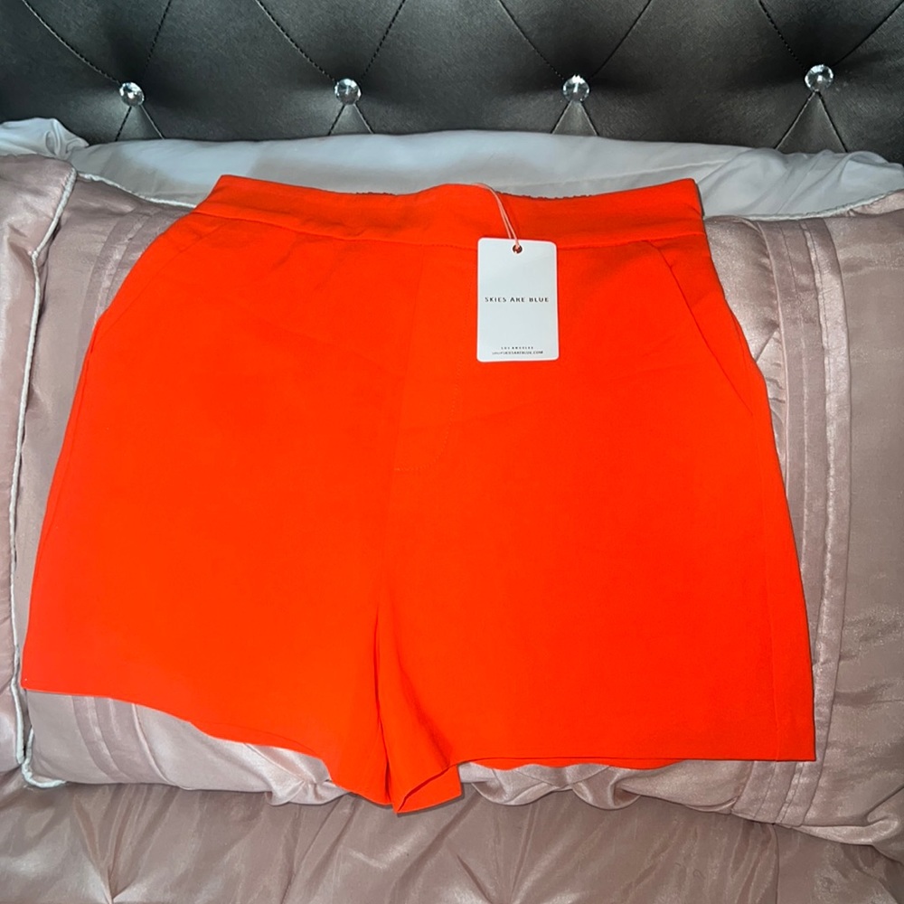 Skies are blue, neon orange structured shorts, xs